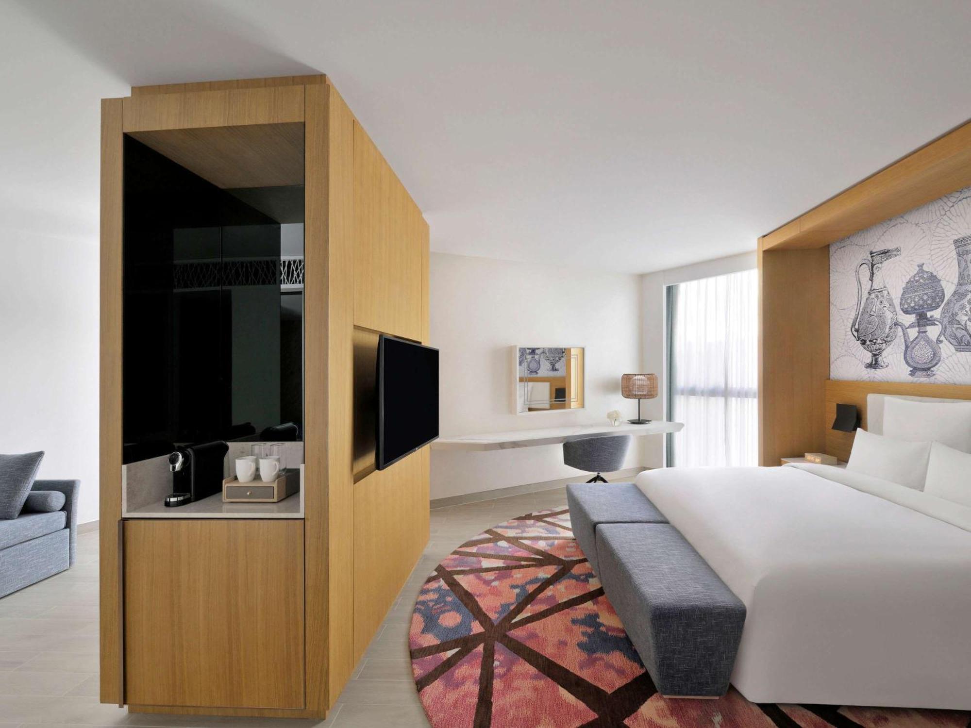 Moevenpick Hotel & Apartments Ghala Muskat Bagian luar foto Deluxe room