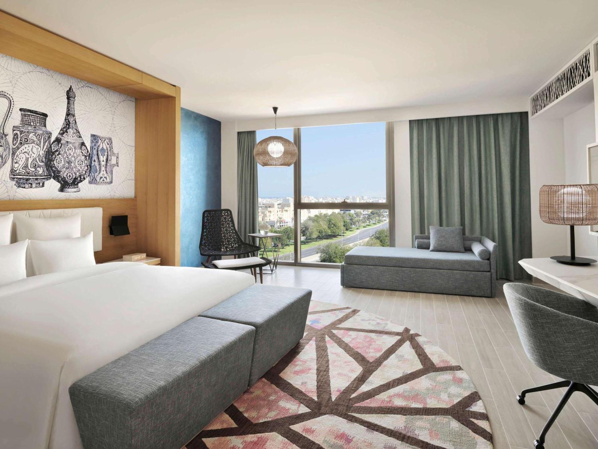 Moevenpick Hotel & Apartments Ghala Muskat Bagian luar foto Deluxe Room